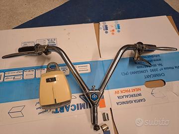 Manubrio completo staffa faro piaggio ciao special
