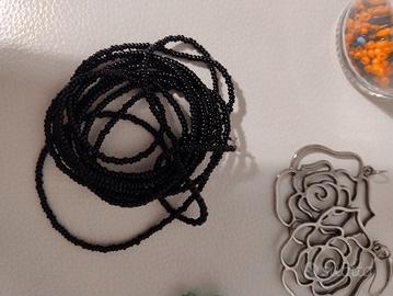 tessuto per stola, bigiotteria e perline