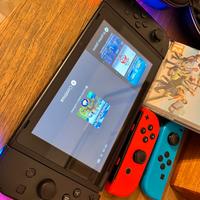 nintendo switch + accessori + 2 giochi