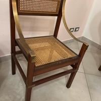 Poltrona vintage in legno e ottone stile classico