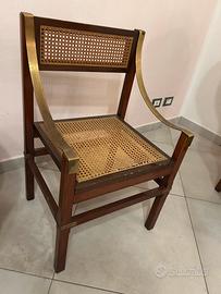 Poltrona vintage in legno e ottone stile classico