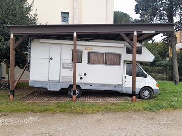 Posto camper coperto