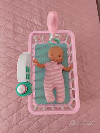 culla di Nenuco con bambolotto