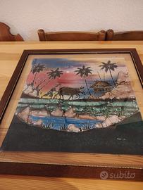 quadro batik raffigura una scena di villaggio trop