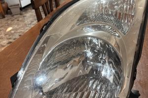 Faro anteriore sinistro suzuki swift 2005 - 2009