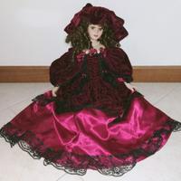 Bambola da collezione + abito di ricambio