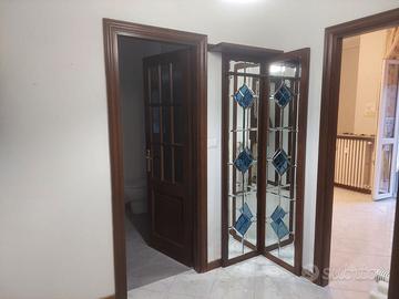 Specchiera decorata con ganci appendiabiti