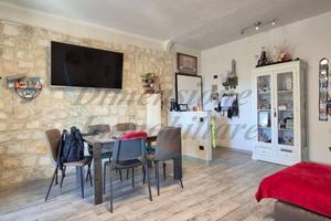 Appartamento di 90 m² con 4 locali e box auto a Ro