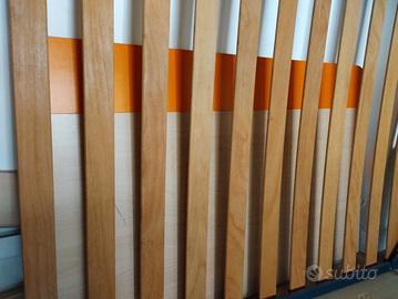Letto una piazza e mezzo con testata in legno