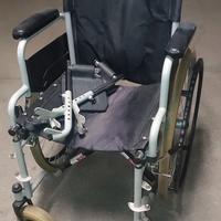 Carrozzina richiudibile con accessori