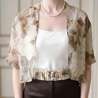 Giacchina corta in pura seta con cintura abbinata 