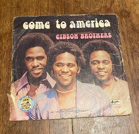 45 giri Come to America  . Gibson Brothers