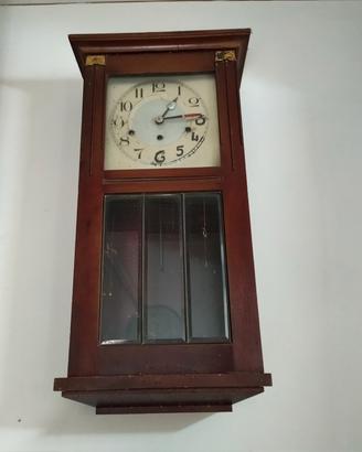 Orologio a pendolo da parete