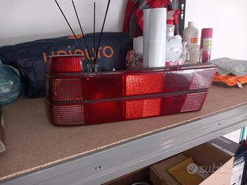 faro sinistro Alfa 75