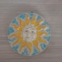 Sole in ceramica da parete