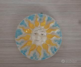 Sole in ceramica da parete