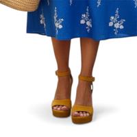 Scarpe gialle con tacco