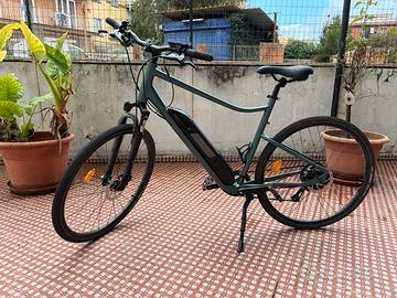 BICICLETTA trekking Riverside 500e
