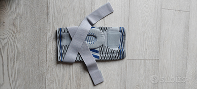Tutore ginocchio con compressione bende elastiche