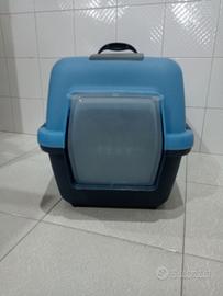 Trasportino toilette con porta basculante.