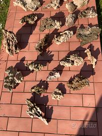 Rocce, sabbia e materiale filtrante