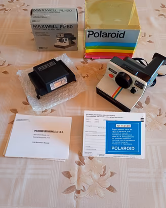 polaroid 1000 Land camera con flash Maxwell 