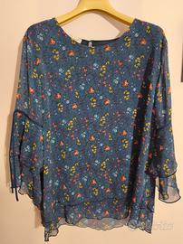 Blusa con manica a tre quarti 