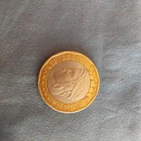 moneta.   di.   1000 lire.  