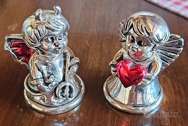 Angioletto e diavoletto in resina argentata