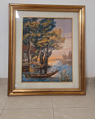 Ricamo artigianale con alberi e lago