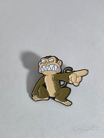 spilla metallo griffin scimmia
