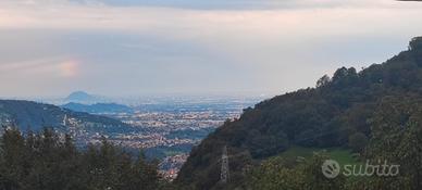 Appartamento con balcone vista colli e Bergamo