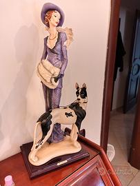 statua 