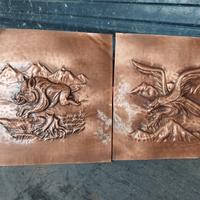 bassorilievo in rame di animali