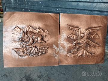 bassorilievo in rame di animali