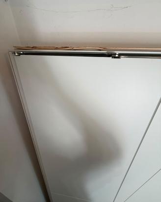 Porta per interni con sistema di apertura rovescia