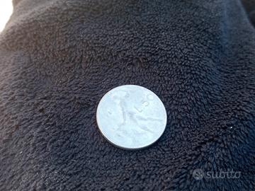 Moneta da 50 lire "Vulcano" del 1981.Errore di con