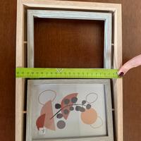 Cornice doppia in legno chiaro