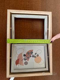 Cornice doppia in legno chiaro