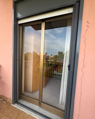 Porte 2 ante in alluminio anodizzato color bronzo