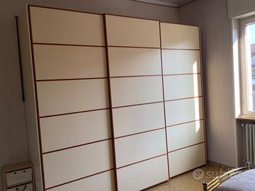 Armadio, cassettiera e comodini.