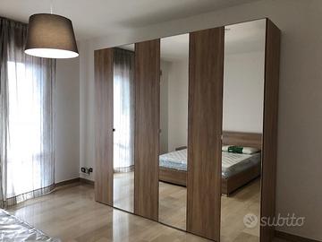 Ad.ze Policlinico: camera arredata