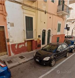 Llocale seminterrato accatastato A5