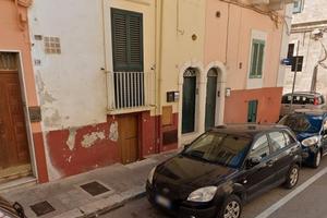 Llocale seminterrato accatastato A5