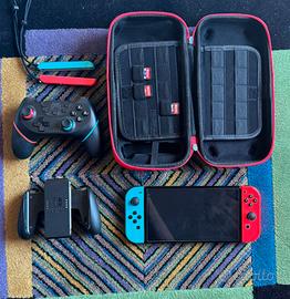 Nintendo Switch Oled + accessori + giochi