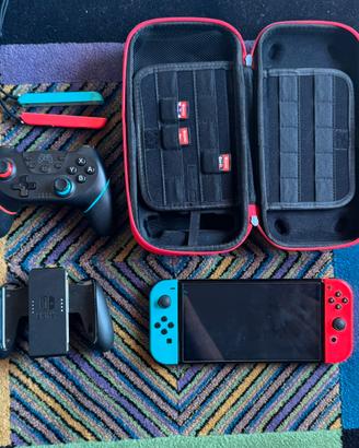 Nintendo Switch Oled + accessori + giochi