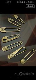 7 Spille grandi in bronzo 