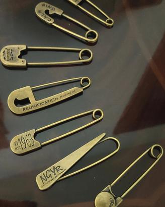 7 Spille grandi in bronzo 