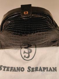 Pochette in coccodrillo Stefano Serapian. 