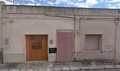 Casa a schiera con grande giardino privato